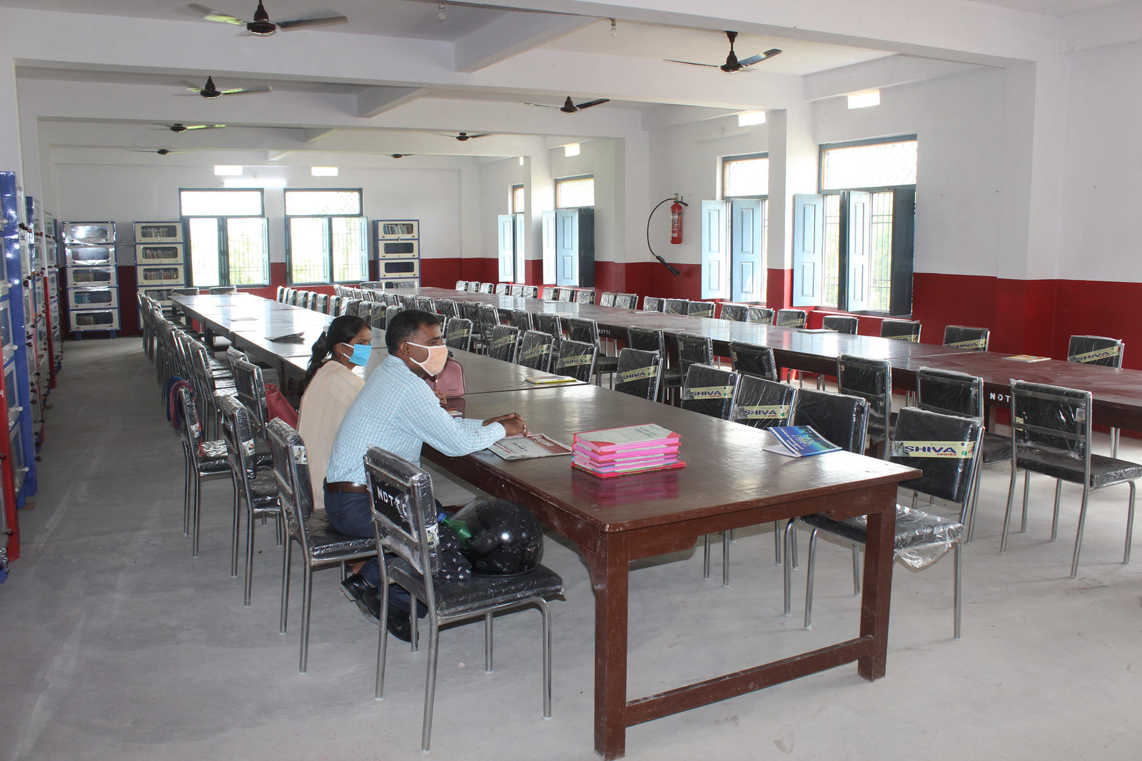 Library reading hall with book cabinets